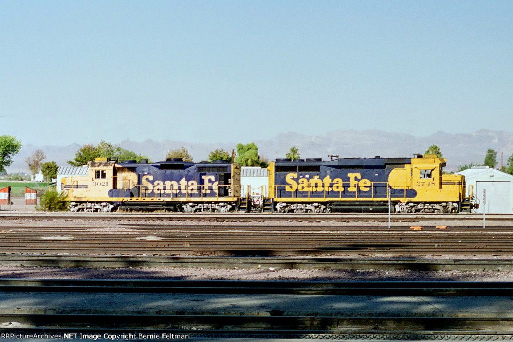 Santa Fe GP20 #3021 GP30 #2748, tied down between local assignments, across from the depot